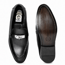 A pair of black leather penny loafers shown from the top and bottom views, featuring a silver-tone metal buckle detail on the vamp and a dark brown wood-grain insole.