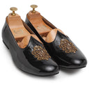 Royal Crest Leather Juttis (Patent Black)(Patent Copyright Artwork) — Black juttis | Modello Domani
